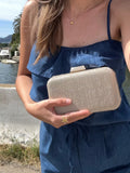 CLUTCH DESTELLO DORADO
