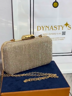 CLUTCH DESTELLO DORADO