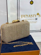 CLUTCH DESTELLO DORADO